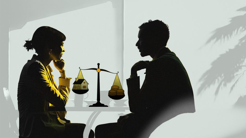 Image of two people negotiating.